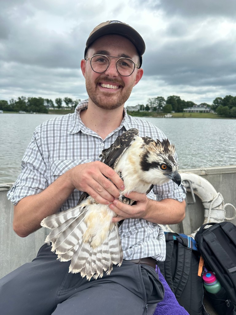 Evan Kinnevan with an Osprey